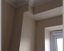 An image of an extension with newly applied plaster