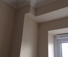 An image of an extension with newly applied plaster